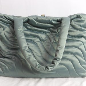 Vanity Nap Wavy Puffer Bag.