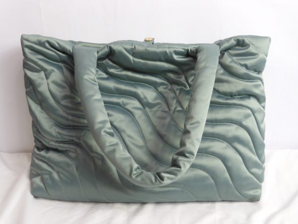 Vanity Nap Wavy Puffer Bag.