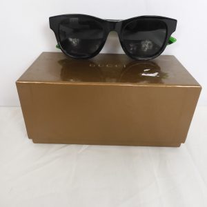 Gucci GG0003SN Sunglasses.
