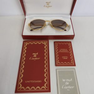 Must De Cartier Gold & Diamond Sunglasses.