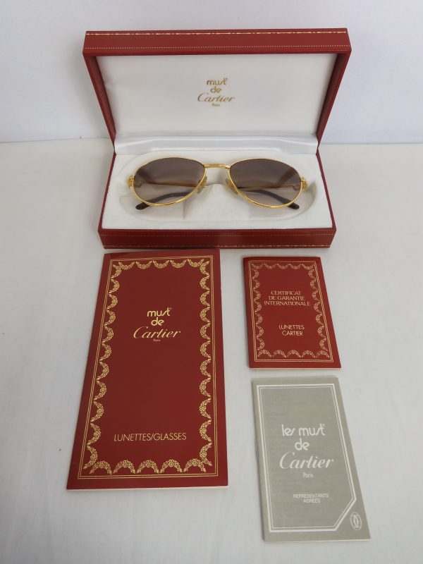 Must De Cartier Gold & Diamond Sunglasses.