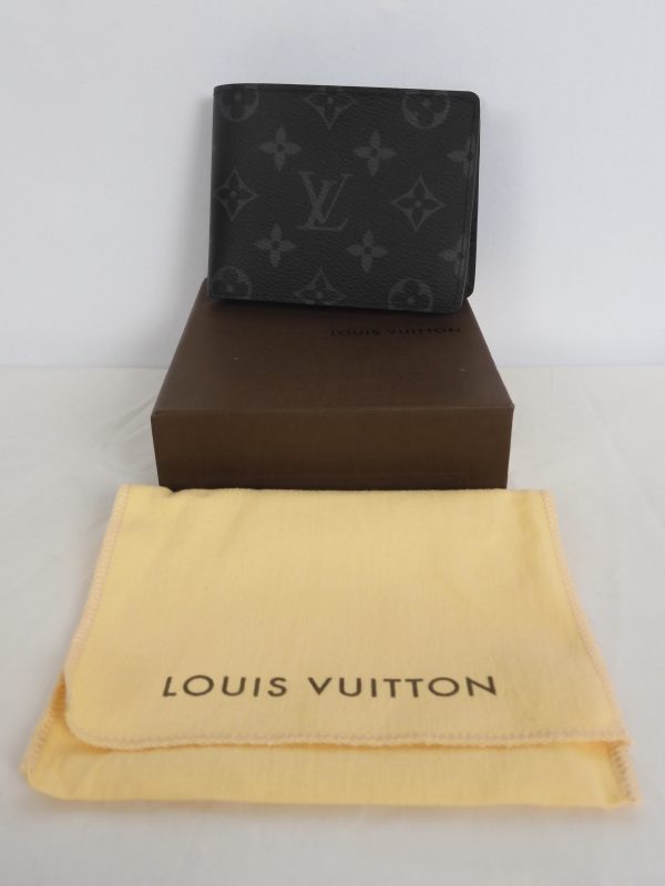 Louis Vuitton Monogram Eclipse Wallet.