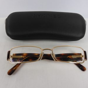 Chanel 2125 eye glasses in brown.
