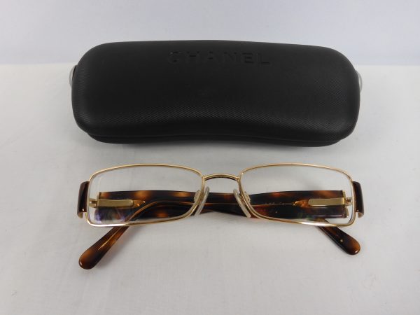 Chanel 2125 eye glasses in brown.